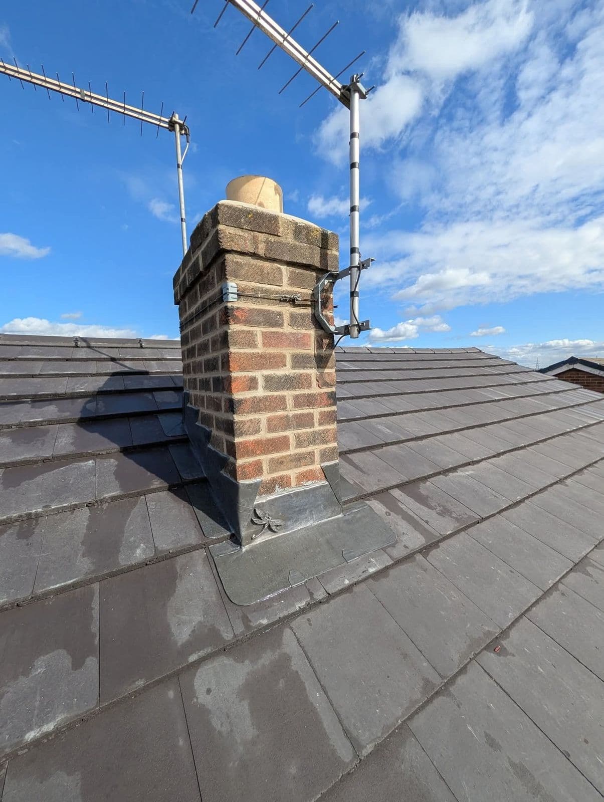 Repointed chimney with new lead flashing