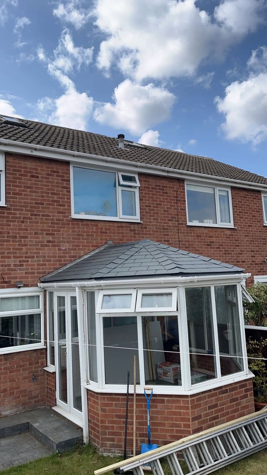Grey tiled conservatory roof