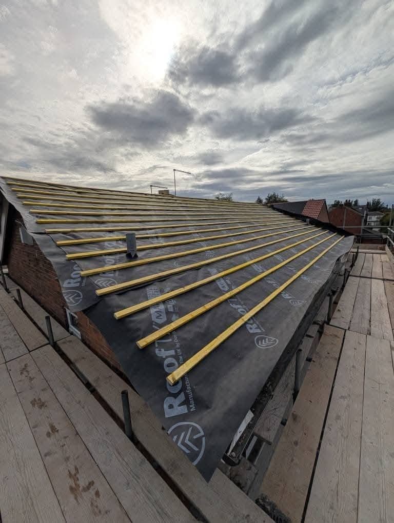 Bungalow roof battened out over new membrane
