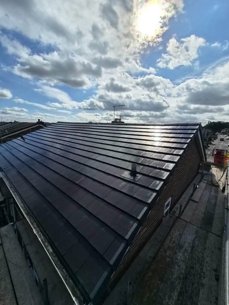 Newly re-roofed bungalow with slate-effect tiles
