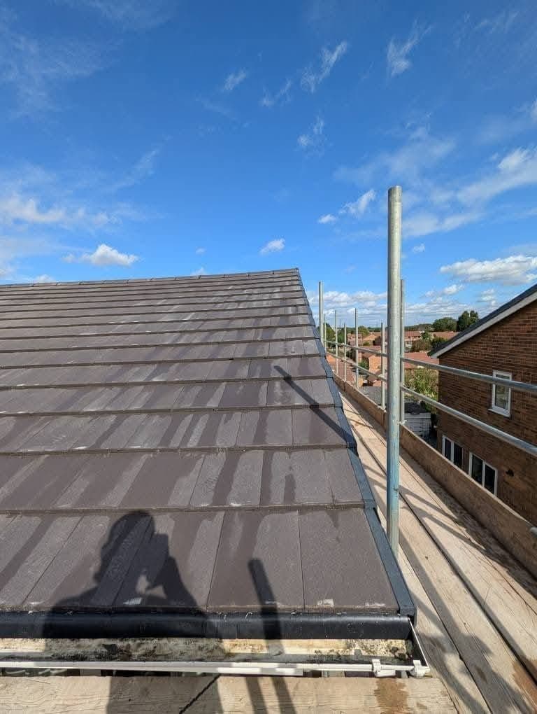 New tiled roof finished at the gable end